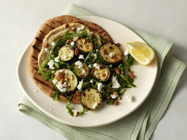 roasted-zucchini-flatbread-with-hummus-arugula-goat-cheese-and-almonds
